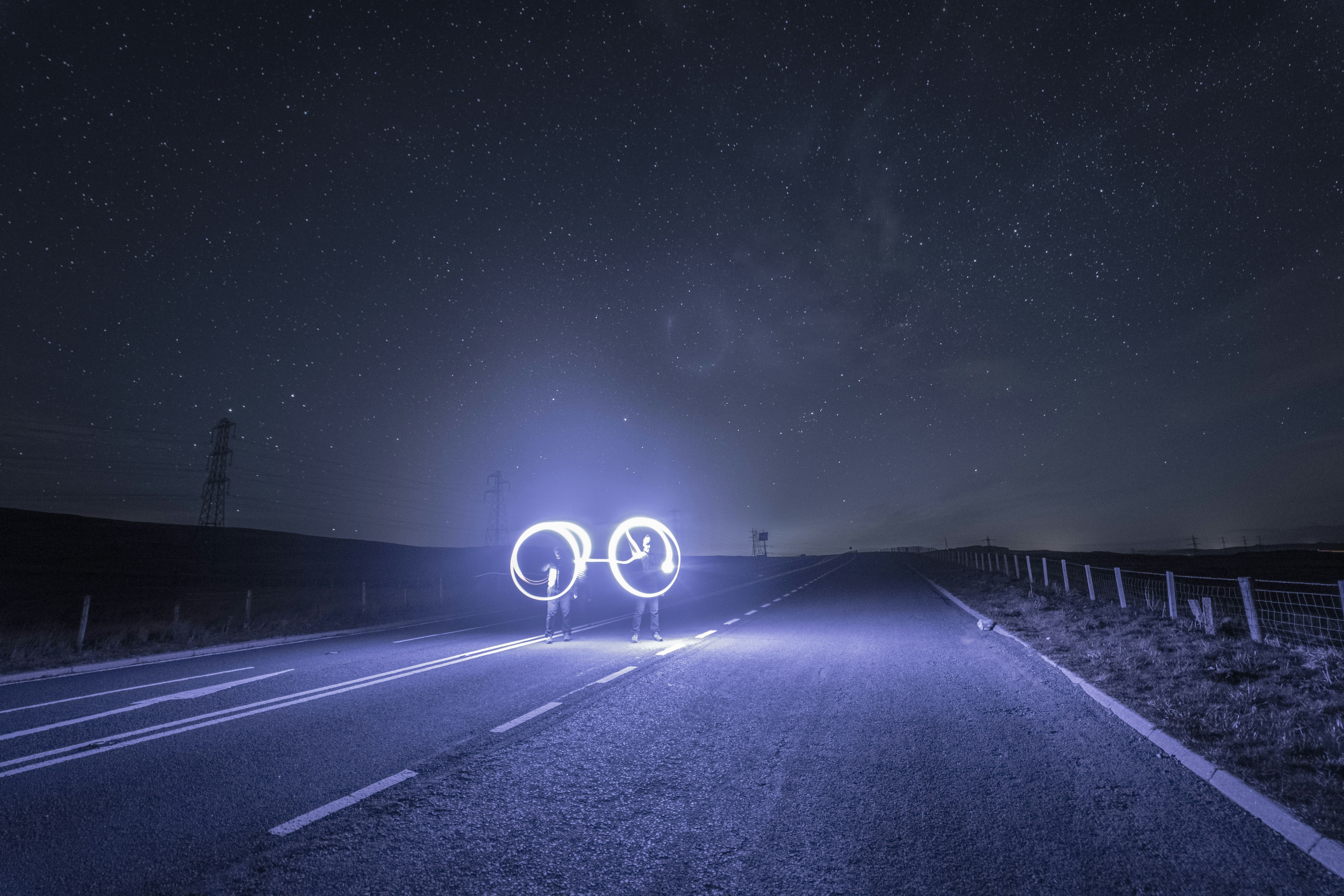 empty road with lights during night time